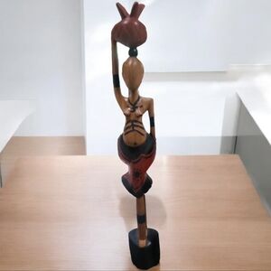 Hand-carved wooden fertility statue